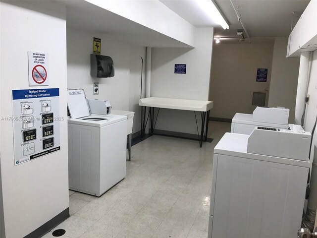 100 Lincoln Rd Unit 1209, Miami Beach, FL 33139 - common laundry area with washing machine and dryer and baseboards