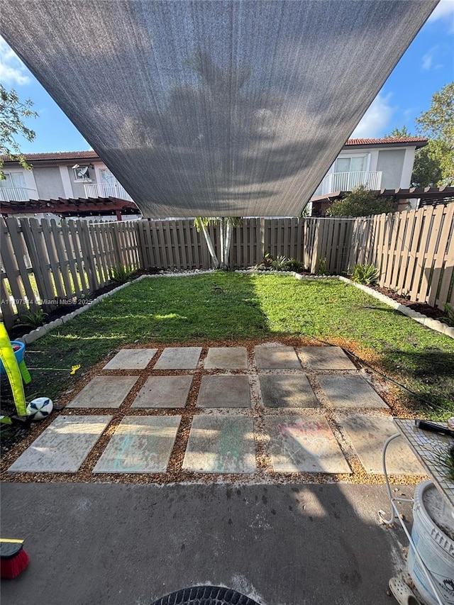 exterior space with a fenced backyard