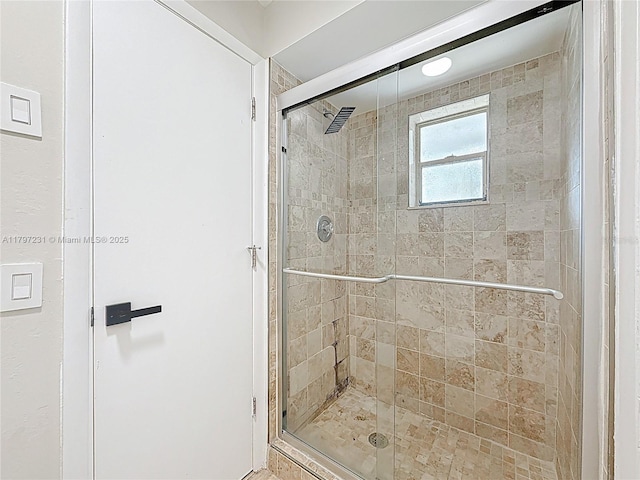 bathroom featuring a stall shower