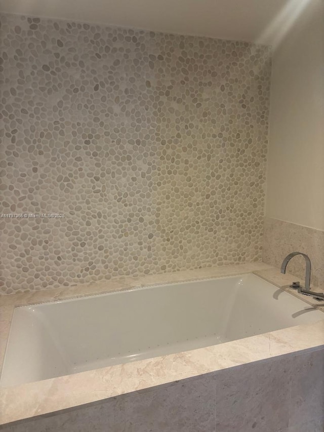 full bathroom with a garden tub