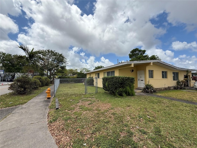 9300 SW 52nd Ter, Miami, FL 33165 - view of side of home featuring stucco siding