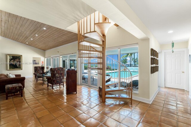 10301 E Broadview Dr, Bay Harbor Islands, FL 33154 - interior space featuring baseboards, wood ceiling, vaulted ceiling, recessed lighting, and ornamental molding