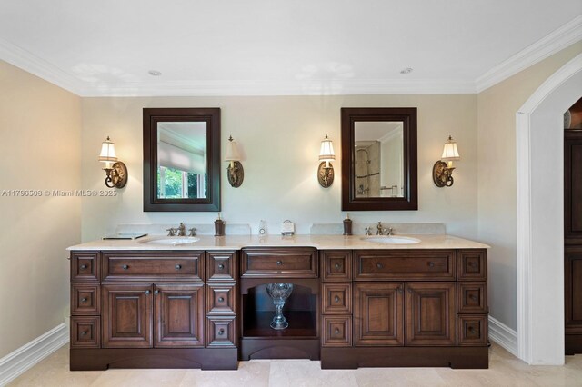 10301 E Broadview Dr, Bay Harbor Islands, FL 33154 - full bathroom with double vanity, crown molding, and baseboards