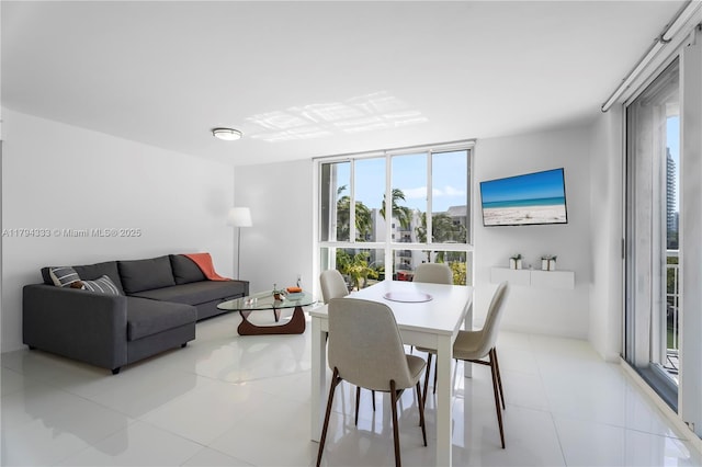 dining area with light tile patterned floors