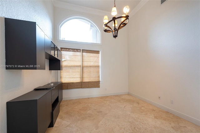 interior space featuring baseboards, a notable chandelier, visible vents, and crown molding