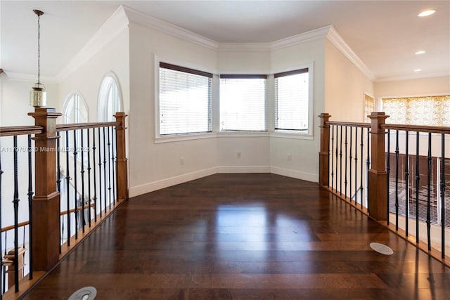 interior space with baseboards, recessed lighting, and wood finished floors