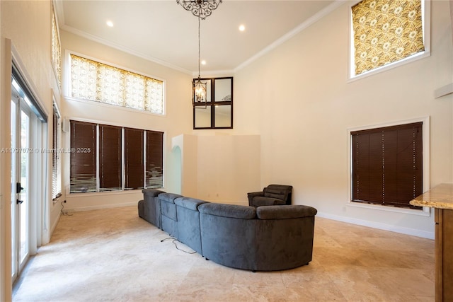 living area with baseboards, ornamental molding, recessed lighting, and a towering ceiling