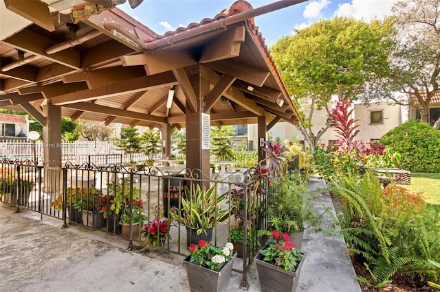 view of patio / terrace featuring a gazebo and fence
