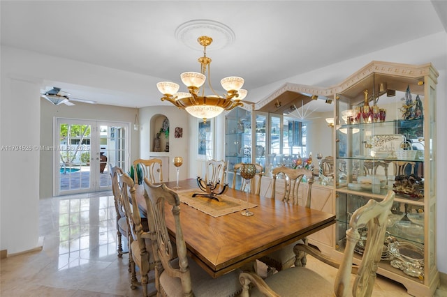 1243 Funston St, Hollywood, FL 33019 - tiled dining room featuring a notable chandelier and french doors
