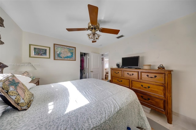 1243 Funston St, Hollywood, FL 33019 - bedroom featuring ceiling fan, a spacious closet, and visible vents