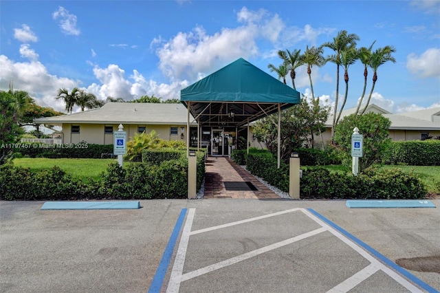 view of property with uncovered parking
