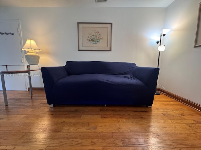 361 Collins Ave Unit A2, Miami Beach, FL 33139 - living area featuring visible vents, baseboards, and hardwood / wood-style flooring