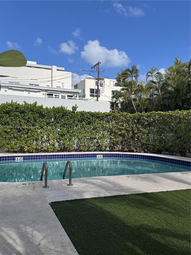 361 Collins Ave Unit A2, Miami Beach, FL 33139 - community pool with a fenced backyard