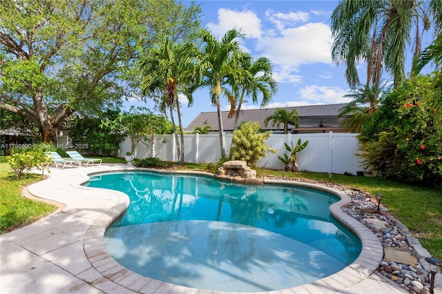 view of swimming pool with a fenced in pool and a fenced backyard