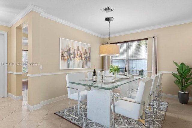 4528 SW 183rd Ave, Miramar, FL 33029 - dining room with tile patterned floors, visible vents, baseboards, and crown molding