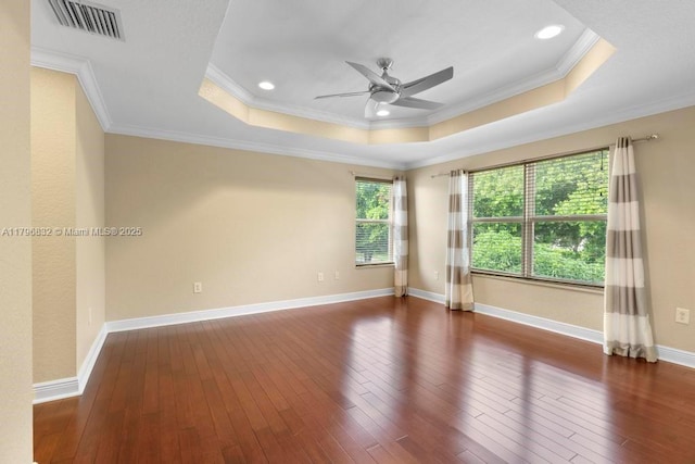 4528 SW 183rd Ave, Miramar, FL 33029 - empty room featuring a raised ceiling, visible vents, ceiling fan, and hardwood / wood-style flooring