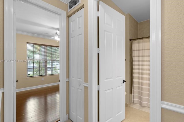 4528 SW 183rd Ave, Miramar, FL 33029 - corridor with visible vents, baseboards, ornamental molding, and a textured wall