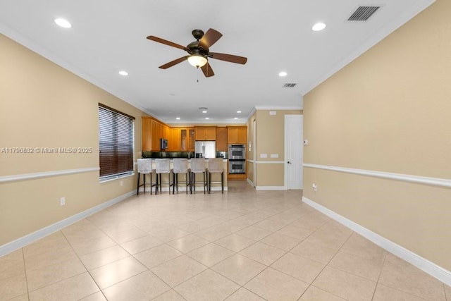 4528 SW 183rd Ave, Miramar, FL 33029 - living area featuring ceiling fan, ornamental molding, visible vents, and recessed lighting