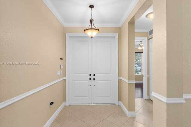 4528 SW 183rd Ave, Miramar, FL 33029 - foyer entrance with crown molding, baseboards, light tile patterned floors, and visible vents