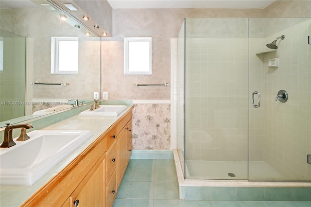 310 Woodcrest Rd, Key Biscayne, FL 33149 - bathroom featuring a shower stall, a healthy amount of sunlight, and a sink