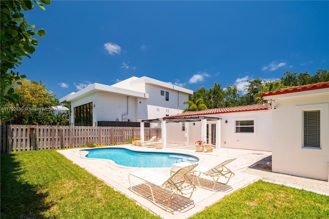 310 Woodcrest Rd, Key Biscayne, FL 33149 - view of pool with a patio area, french doors, a fenced backyard, a fenced in pool, and a lawn