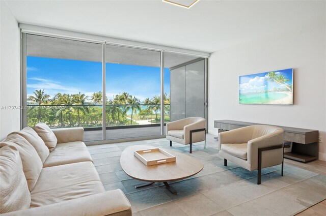 10201 Collins Ave Unit 303, Bal Harbour, FL 33154 - living area with a wall of windows