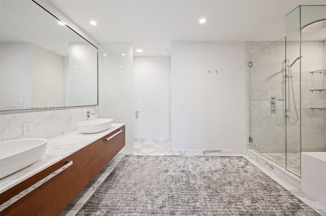 10201 Collins Ave Unit 303, Bal Harbour, FL 33154 - full bath featuring a shower stall, recessed lighting, double vanity, and marble finish floors