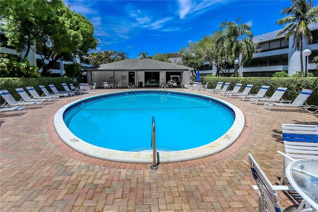 pool with a patio area