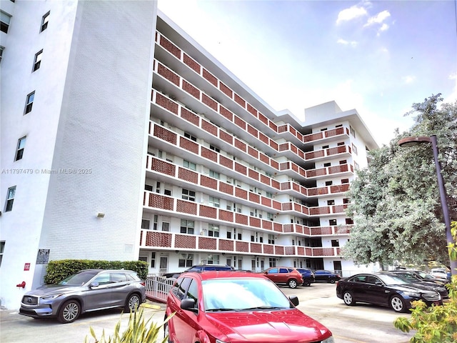 3660 NE 166th St Unit 302, North Miami Beach, FL 33160 - view of property with uncovered parking