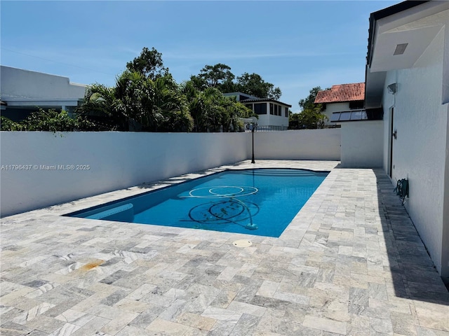 1900 SW 24th St, Miami, FL 33145 - view of pool featuring a fenced backyard and a patio area