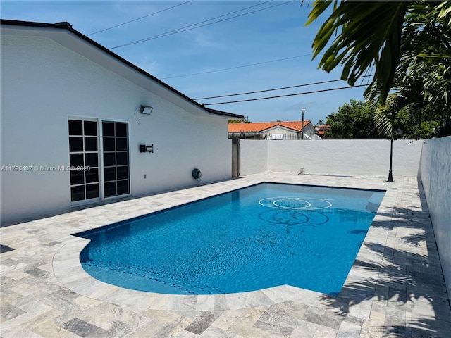 1900 SW 24th St, Miami, FL 33145 - view of pool with a fenced backyard and a patio