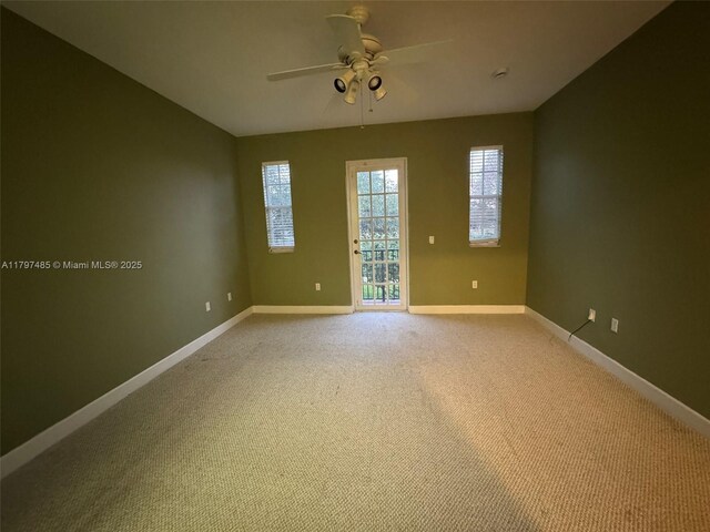 8706 Blaze Ct, Davie, FL 33328 - spare room featuring ceiling fan, baseboards, and light colored carpet