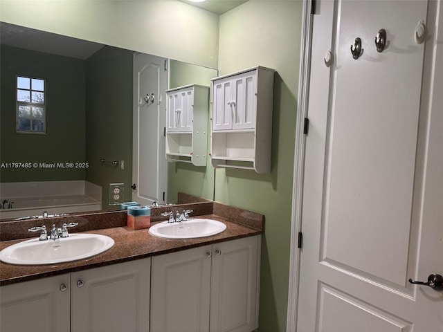 8706 Blaze Ct, Davie, FL 33328 - bathroom featuring double vanity and a garden tub