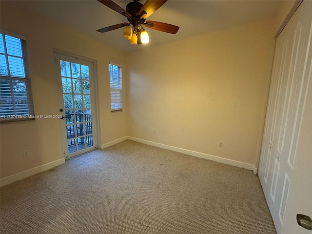 8706 Blaze Ct, Davie, FL 33328 - carpeted spare room with baseboards and ceiling fan