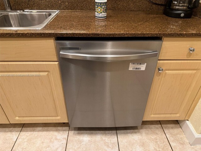 8706 Blaze Ct, Davie, FL 33328 - kitchen view of dishwasher, a sink, and dark stone counters