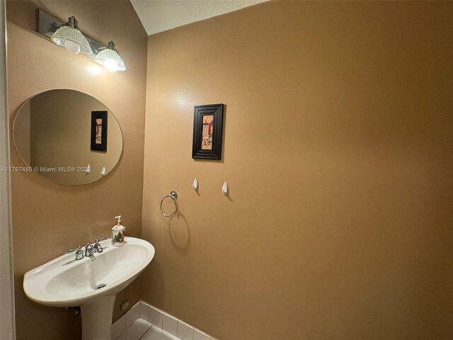 8706 Blaze Ct, Davie, FL 33328 - bathroom with a sink and baseboards