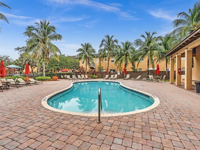 8706 Blaze Ct, Davie, FL 33328 - community pool with a patio area