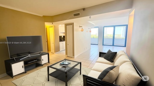 1500 N Ocean Blvd Unit 502, Pompano Beach, FL 33062 - living room with light tile patterned flooring