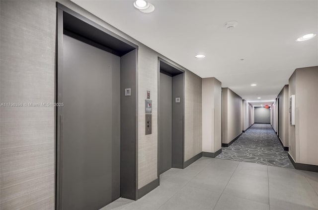 770 Claughton Island Dr Unit 1114, Miami, FL 33131 - corridor featuring elevator, recessed lighting, and light tile patterned floors