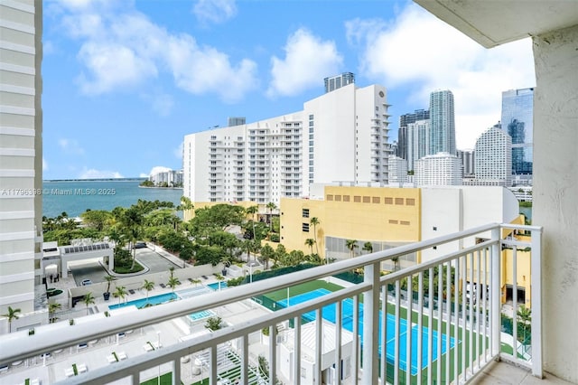 770 Claughton Island Dr Unit 1114, Miami, FL 33131 - balcony with a skyline view, view of pool, and a water view
