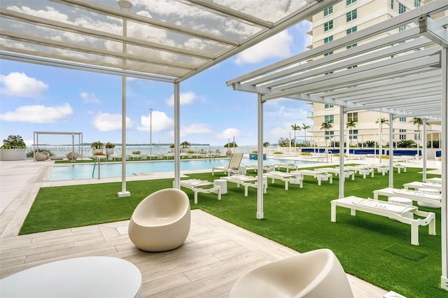 770 Claughton Island Dr Unit 1114, Miami, FL 33131 - view of community with a pool, a lawn, and a water view