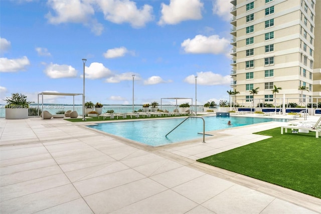 770 Claughton Island Dr Unit 1114, Miami, FL 33131 - community pool with a patio and a lawn
