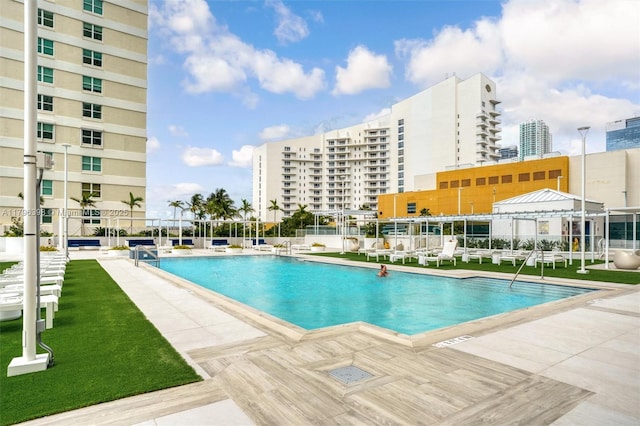 770 Claughton Island Dr Unit 1114, Miami, FL 33131 - community pool with a patio area and a city view