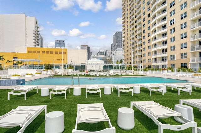 770 Claughton Island Dr Unit 1114, Miami, FL 33131 - community pool featuring a lawn and a view of city