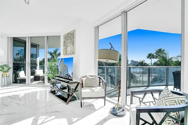 sunroom featuring a healthy amount of sunlight
