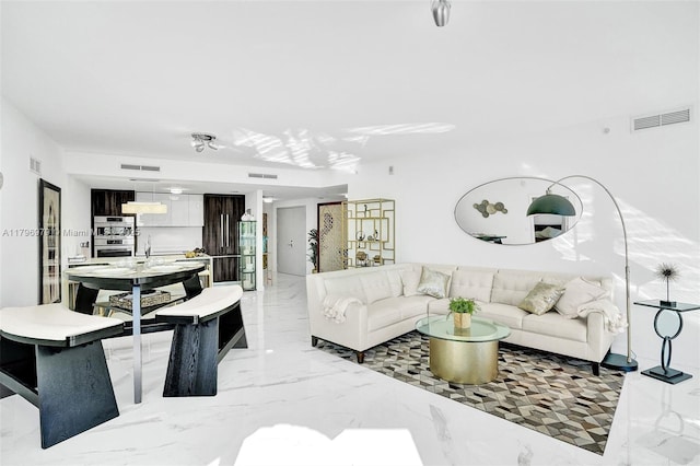 488 NE 18th St Unit 208, Miami, FL 33132 - living area with light marble finish floors