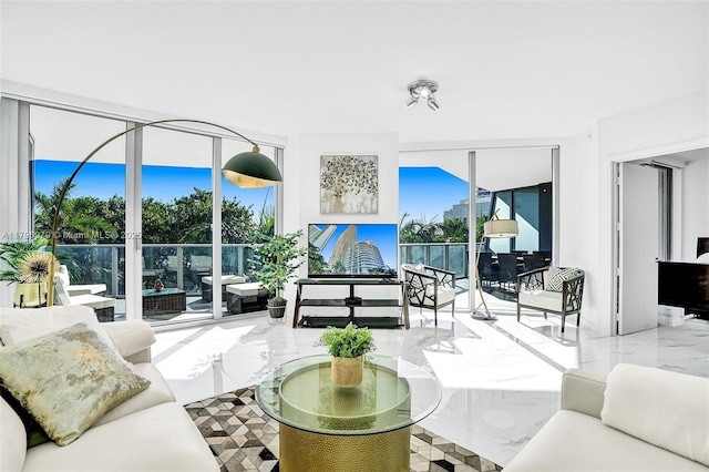 488 NE 18th St Unit 208, Miami, FL 33132 - living room with floor to ceiling windows and marble tiled flooring