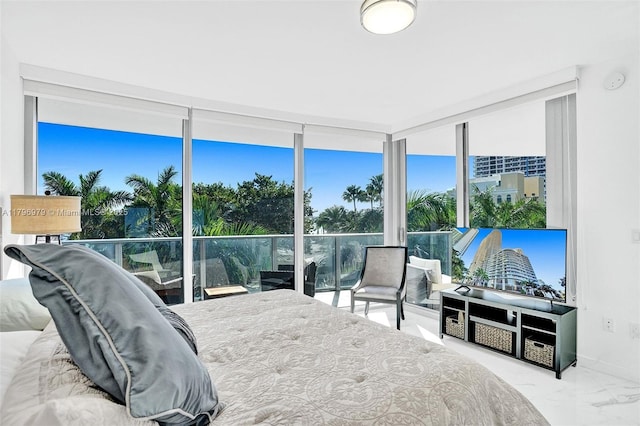 488 NE 18th St Unit 208, Miami, FL 33132 - bedroom with marble finish flooring and floor to ceiling windows