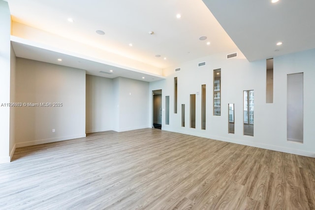 488 NE 18th St Unit 208, Miami, FL 33132 - spare room featuring light wood-type flooring and recessed lighting