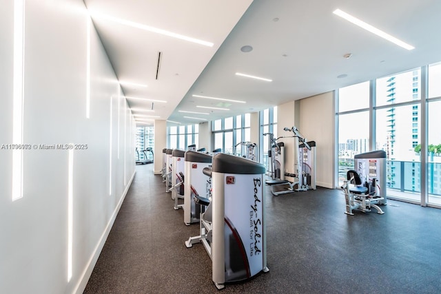 488 NE 18th St Unit 208, Miami, FL 33132 - exercise room with a wall of windows
